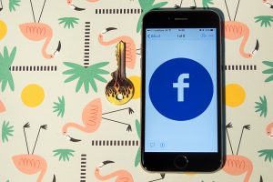 Facebook logo on phone