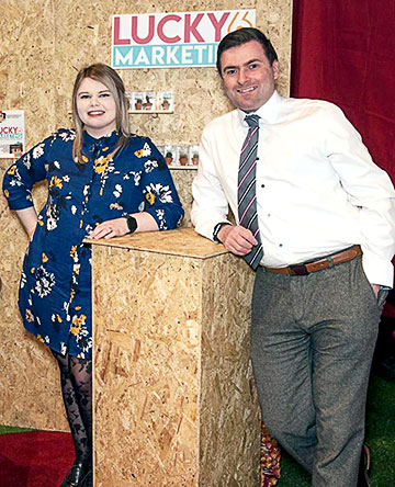 Lee Giacopazzi stood with Terri Juniper at the Lucky 6 Marketing stand.